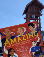 "Amazing: Asian Americans and Pacific Islanders Who Inspire Us All" by Olympic medalists Maia and Alex Shibutani, taken in Little Tokyo with the red Yagura Tower.